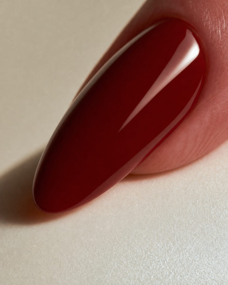 Deep oxblood high gloss on medium almond nails